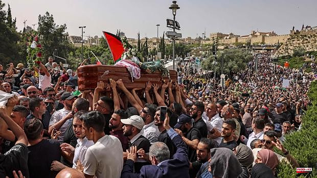 Tumultuous funeral for Al Jazeera journalist allegedly killed by Israeli gunfire