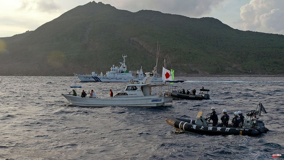 Japan visits Russia and China warships close to disputed islands