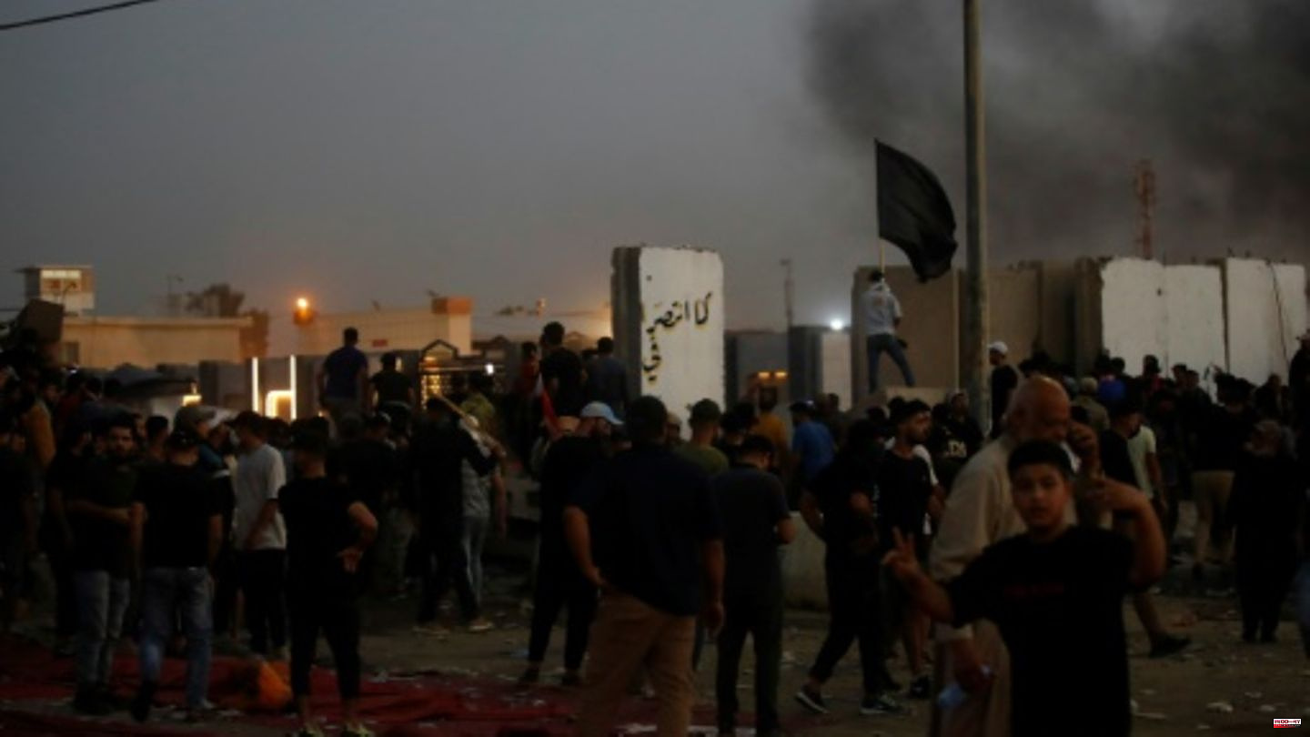 At least 12 dead in protests by angry Sadr supporters in Iraq
