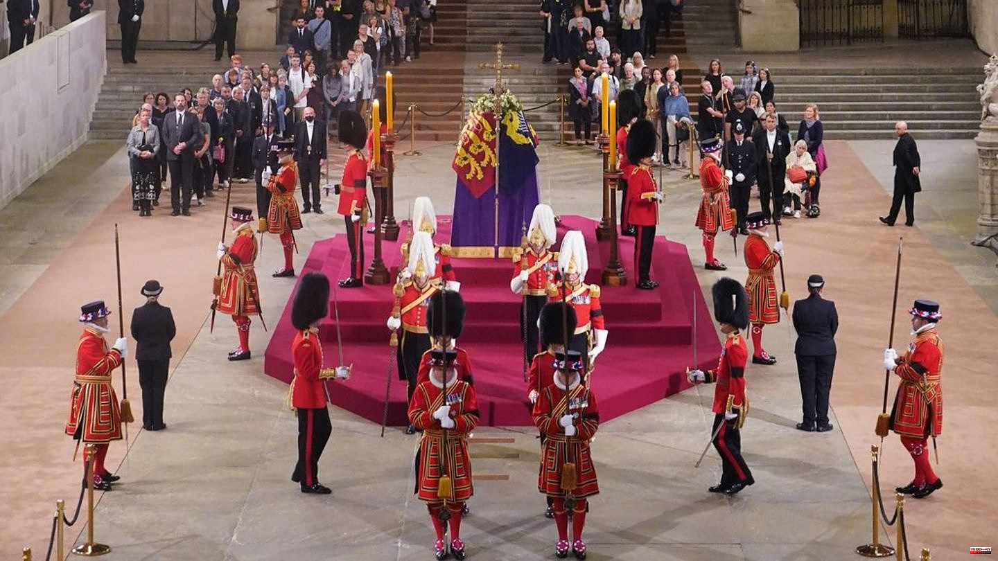 In front of the Queen's coffin: A security guard collapsed
