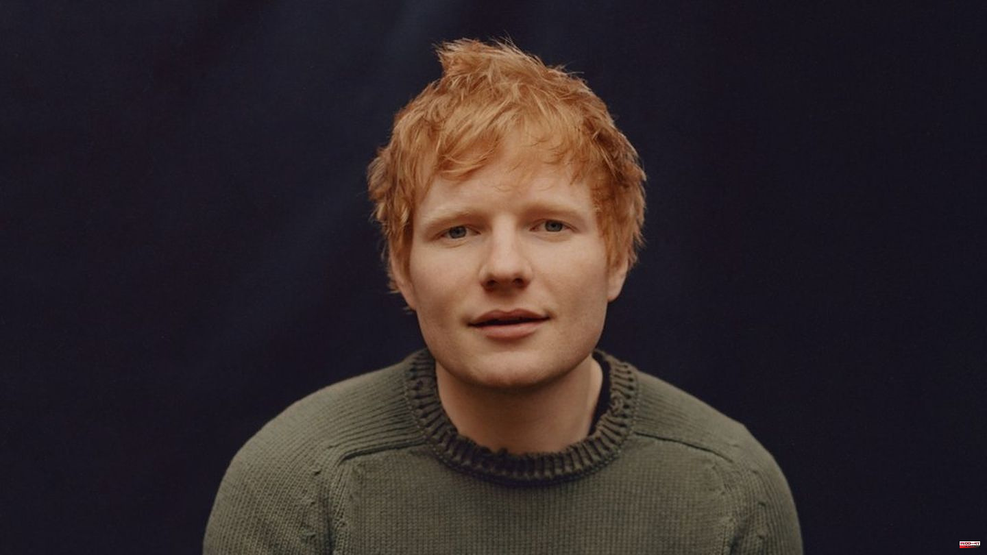 Ed Sheeran: Singer-songwriter braves the rain in Munich