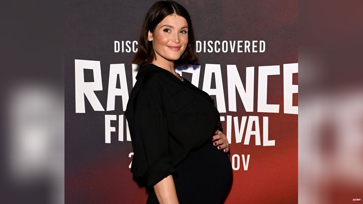 Gemma Arterton: Star shows off his baby bump on the red carpet