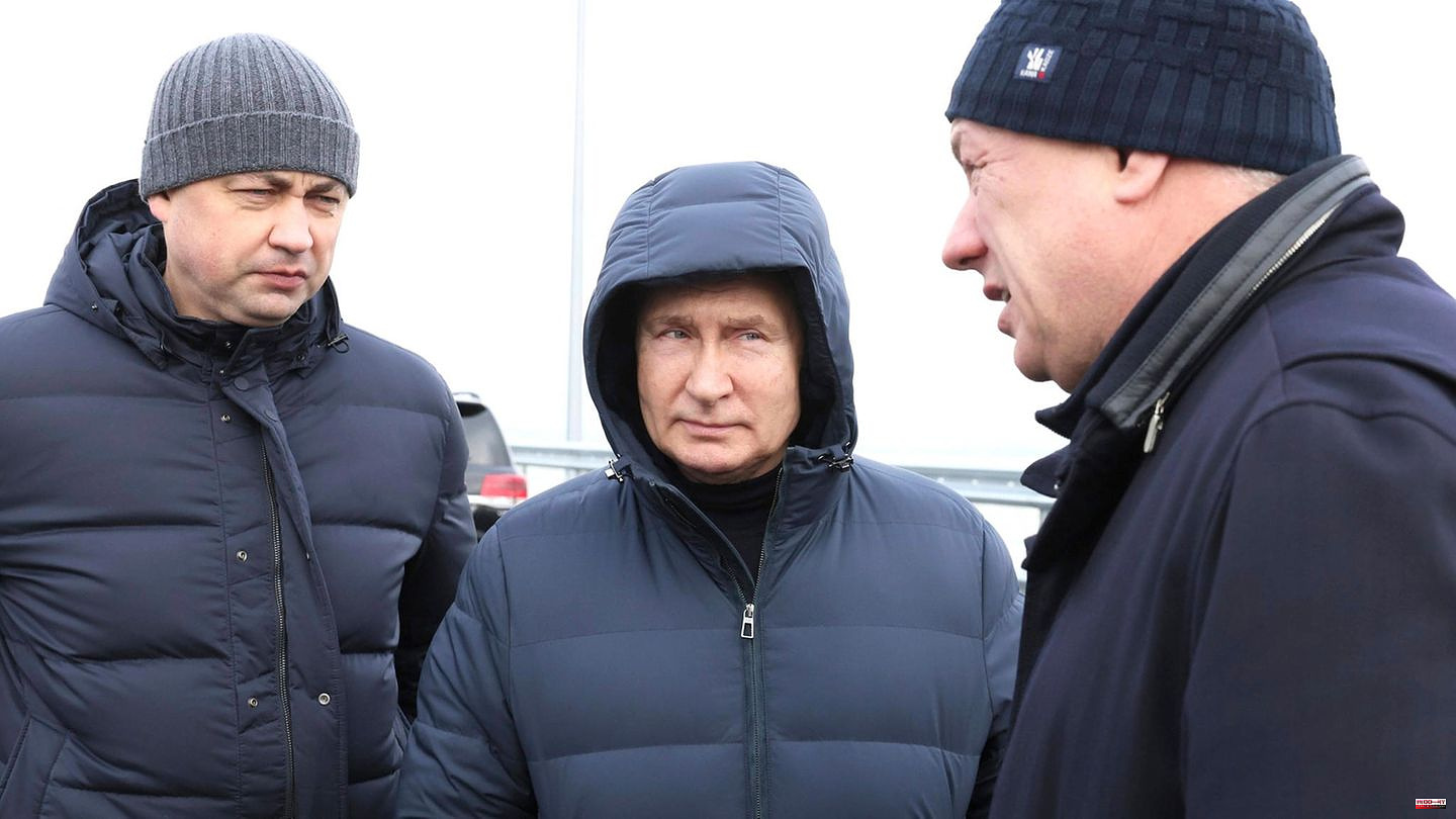 Telling details: Putin inspects the Crimean bridge - but his appearance reveals more than intended