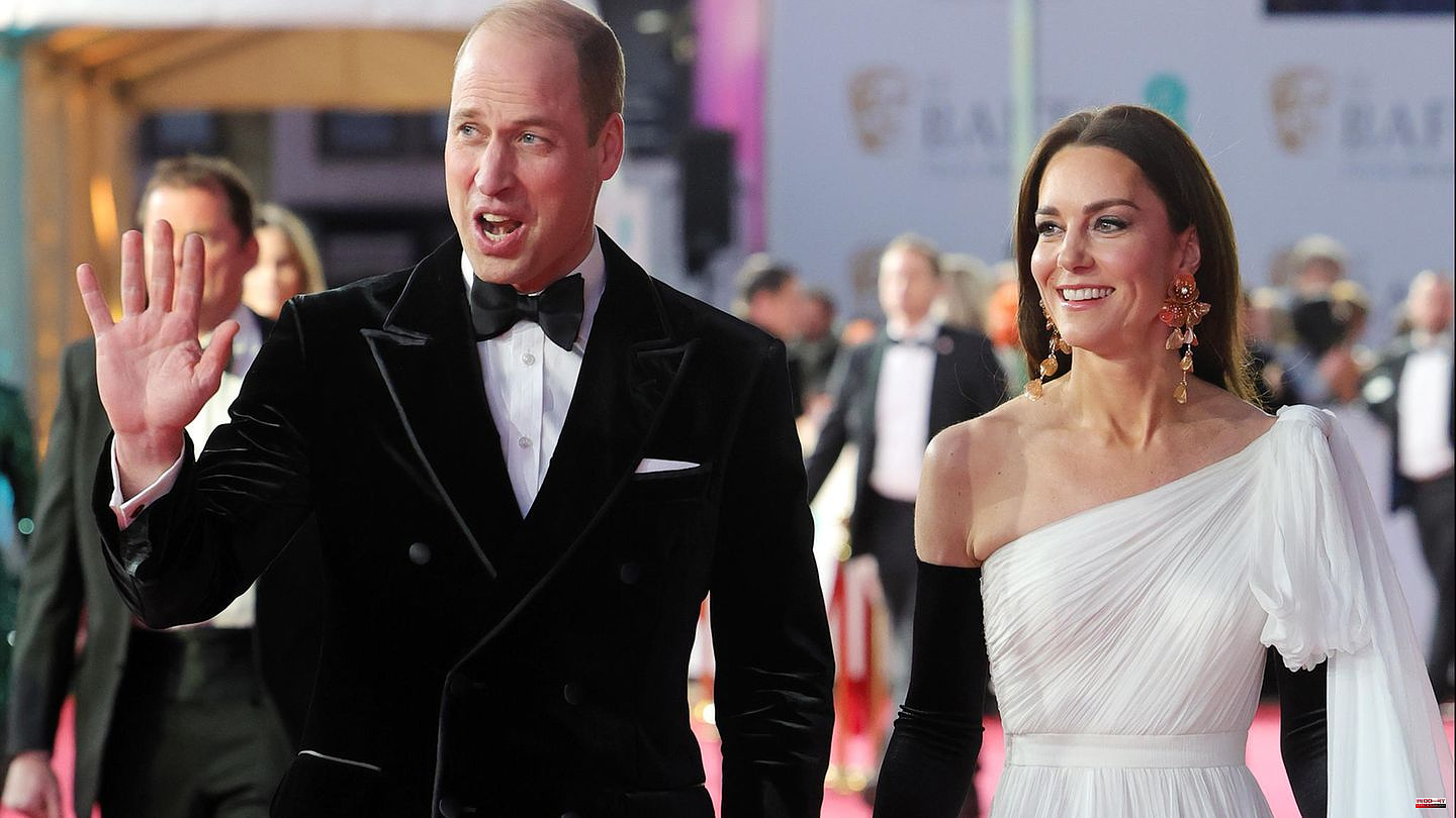 BAFTAS: Unusually teasing: Princess Kate grabs Prince William's butt