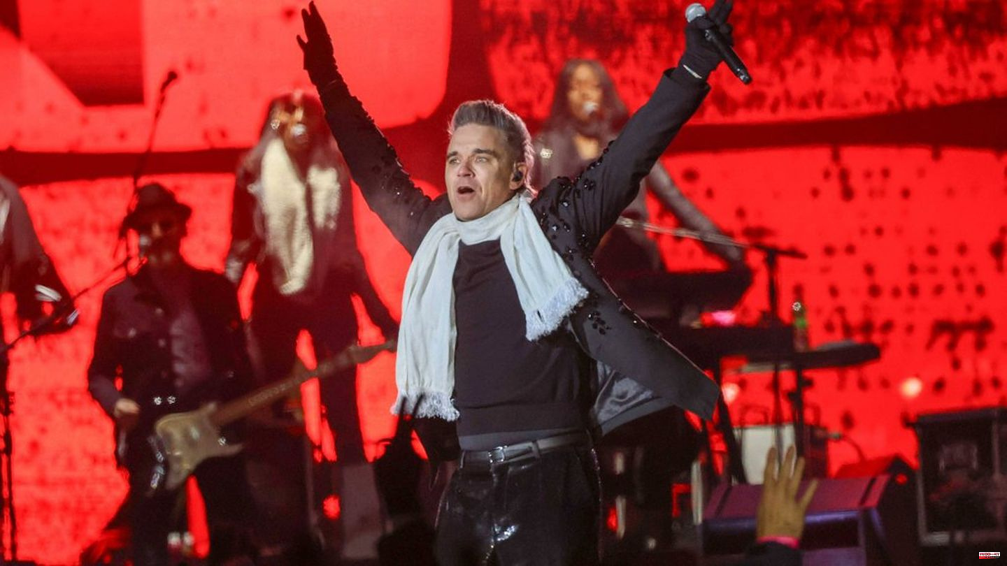 Robbie Williams: Pop star performs at the ski opening