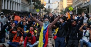 Protesters defy curfew in Colombia's capital
