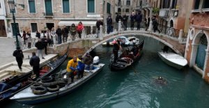 Gondoliers fishing 600 pounds of waste, up from the...