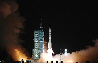 China's Shenzhou-13 spacecraft docks with Earth...