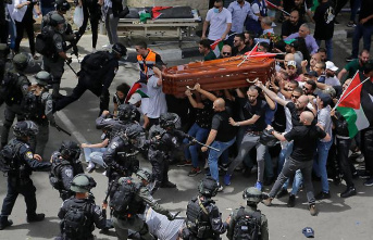 Reporter killed in Jerusalem: Violence at funeral triggers outrage around the world