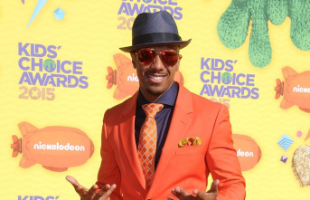 Now double digits: Nick Cannon has become a father...