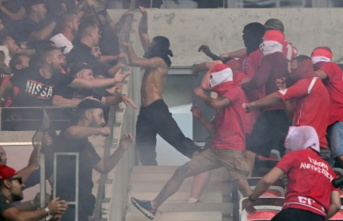 Fan seriously injured in riots before football game...