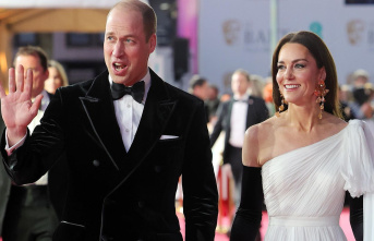BAFTAS: Unusually teasing: Princess Kate grabs Prince...