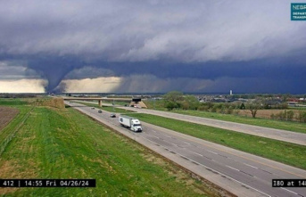Dozens of tornadoes rip through the center of the...