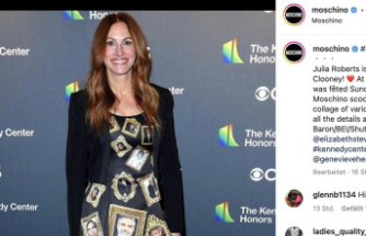 US actress: Julia Roberts wears a dress with photos of George Clooney on it