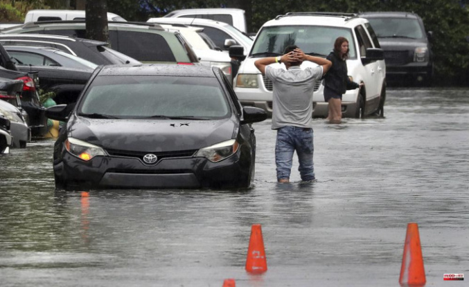 Florida is hit hard by heavy rains, flooding Miami and leaving vehicles stranded.